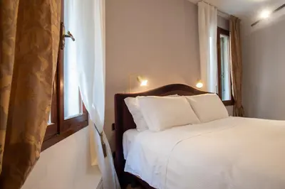 Letto o letti in una camera di Appartamento Veneziano