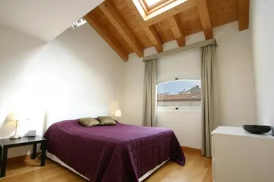 Letto o letti in una camera di City Apartments Cannaregio