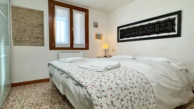 Letto o letti in una camera di City Apartments Cannaregio