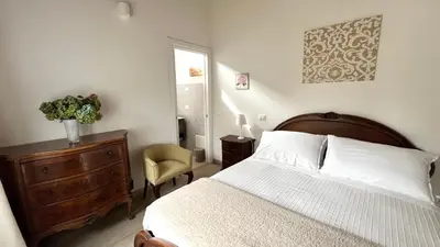 Letto o letti in una camera di Acero Rosso
