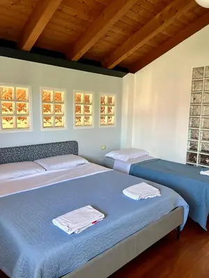 Letto o letti in una camera di BikeBnB