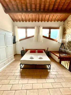 Letto o letti in una camera di Al Portico
