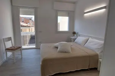 Letto o letti in una camera di Nuovo Appartamento in centro con vista mare