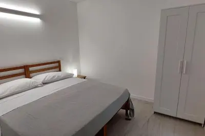 Letto o letti in una camera di Nuovo Appartamento in centro con vista mare