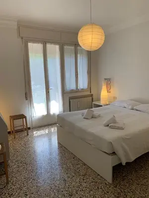 Letto o letti in una camera di Comodo appartamento al centro del Lido di Venezia