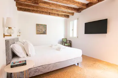 Letto o letti in una camera di Roof-top terrace vicino San Marco e Canale Grande