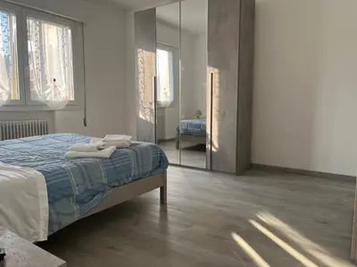 Letto o letti in una camera di At Home Mestre Via Nigra Venezia 3 bedrooms & parking free