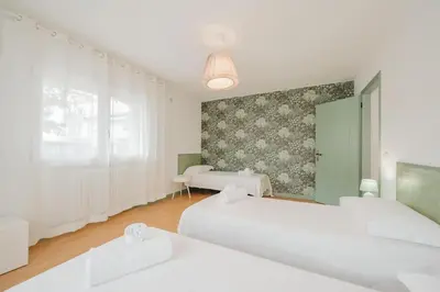 Letto o letti in una camera di Novalesi Vintage interno 2