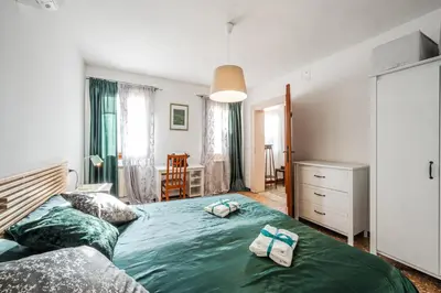 Letto o letti in una camera di QUEEN HOME Carlotta