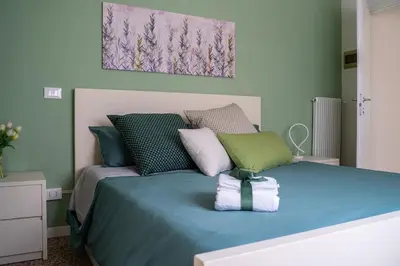 Letto o letti in una camera di Appartamento da Nonna Olly