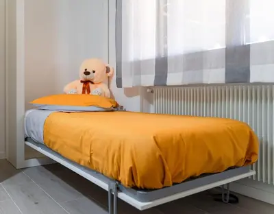 Letto o letti in una camera di Appartamento da Nonna Olly