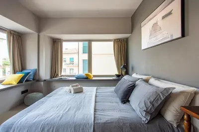 Letto o letti in una camera di Grey Loft Treviso