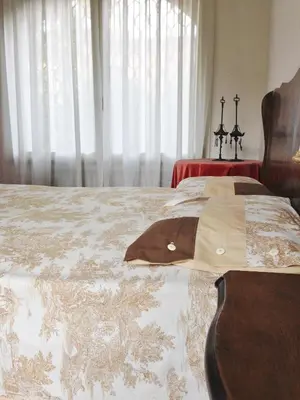 Letto o letti in una camera di Casa di Mafalda