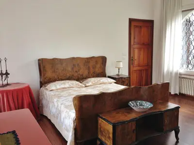 Letto o letti in una camera di Casa di Mafalda