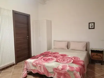 Letto o letti in una camera di B&B Il Maggiociondolo