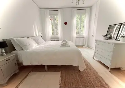 Letto o letti in una camera di Garden Lodge by Veneto Villa