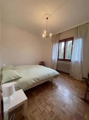 Letto o letti in una camera di Appartamento in centro storico