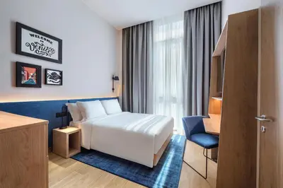 Letto o letti in una camera di Hampton By Hilton Venice Isola Nuova