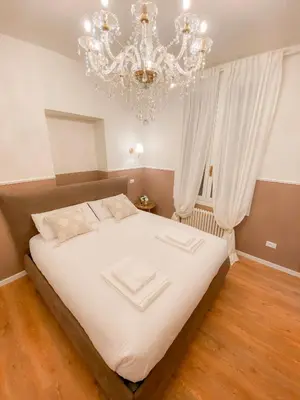 Letto o letti in una camera di San Polo Luxury Suites in Venice