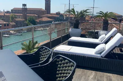 Area soggiorno di MURANO Suites - Venezia