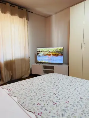 Letto o letti in una camera di First Dream Mestre