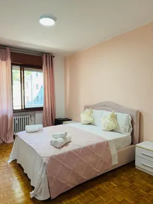 Letto o letti in una camera di First Dream Mestre
