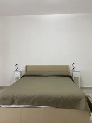 Letto o letti in una camera di A-B House