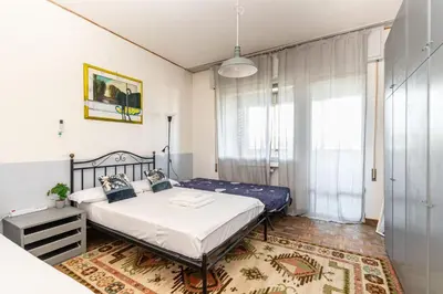 Letto o letti in una camera di GuestHost - Mestre Roomy Apartment!