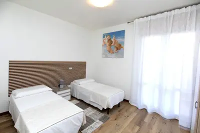Letto o letti in una camera di Martina 2