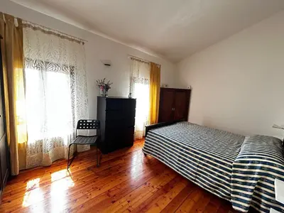 Letto o letti in una camera di Casale Gelsomino primo piano
