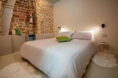 Letto o letti in una camera di IvY, canal view