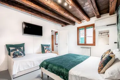 Letto o letti in una camera di Appartamento a Piazza San Marco