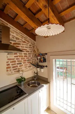 Cucina o angolo cottura di B&B La Porta Rossa
