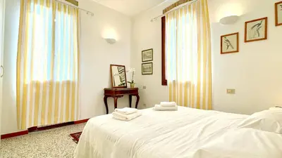 Letto o letti in una camera di Residence Moretta - Historical Center