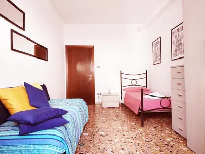 Letto o letti in una camera di Ca' Vivaldi Appartamento Mestre