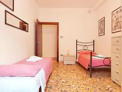 Letto o letti in una camera di Ca' Vivaldi Appartamento Mestre