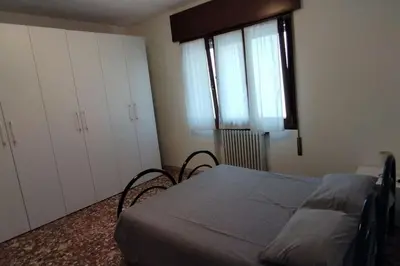 Letto o letti in una camera di Ca' Vivaldi Appartamento Mestre
