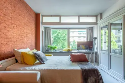 Area soggiorno di Orange Loft Treviso