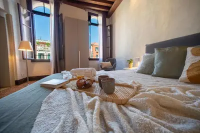 Letto o letti in una camera di Venice Dream - Il più centrale, idromassaggio in camera, ascensore - 10 min da Rialto e San Marco