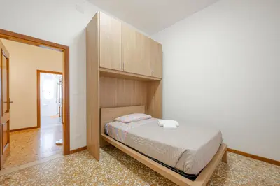 Letto o letti in una camera di Tatiana Flat - 10 minutes to Venice - Mestre Train Station - Free Parking