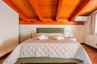 Letto o letti in una camera di 7º Cielo Comfort Apartment Venice - Mestre