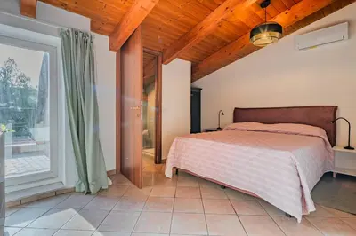 Letto o letti in una camera di 7º Cielo Comfort Apartment Venice - Mestre