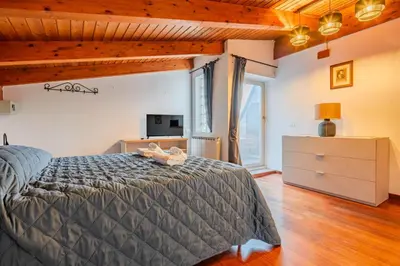Letto o letti in una camera di 7º Cielo Comfort Apartment Venice - Mestre