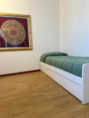 Letto o letti in una camera di Appartamento Marisa