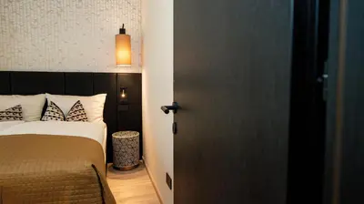 Letto o letti in una camera di Relais Santa Lucia - Appartamenti Luxury e Premium