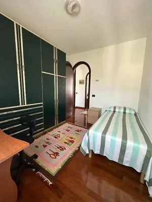 Letto o letti in una camera di Villa Colombella