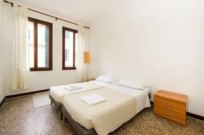 Letto o letti in una camera di Borgo Canal View by Sarlux