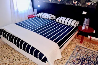 Letto o letti in una camera di Casa Corte delle Ancore