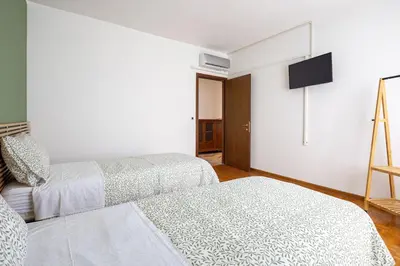 Letto o letti in una camera di Casa Genny