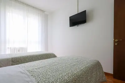Letto o letti in una camera di Casa Genny